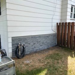 Stucco, chimney, stone, concrete, foundation (Stillwater) picture
